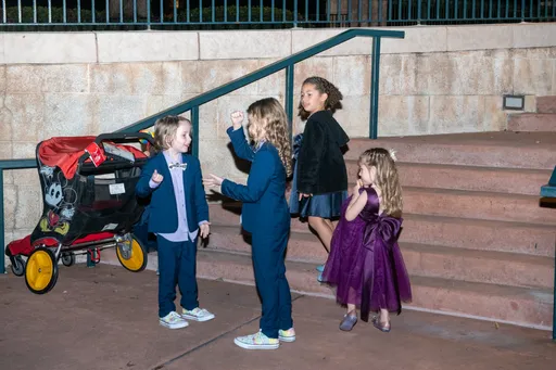 A candid photo of 4 people